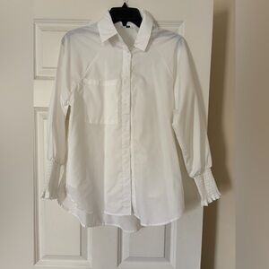 Oversized White Button-Up Blouse with smocked cuff at end of sleeve